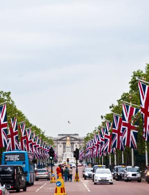 a British flag-lined street leading up to the Victoria Memorial