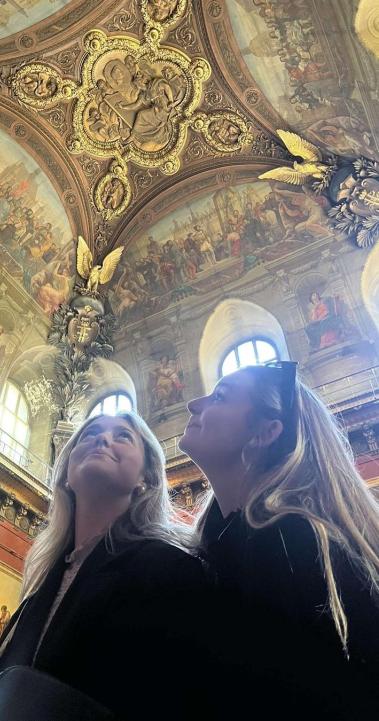 Students looking at museum ceiling in Paris